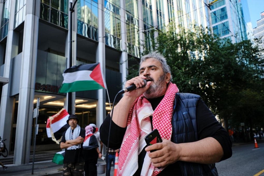 Khaled Barakat speaks at a Samidoun and Masar Badil joint rally in Vancouver, Canada, June 2024