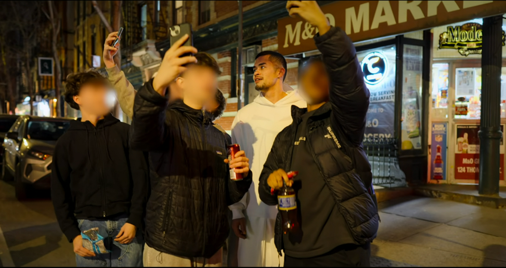 Screenshot: A screenshot from the Theroux documentary of Sneako engaging with teenaged fans in New York. (Screenshot/Netflix)