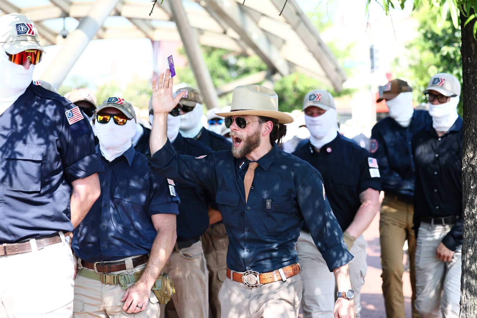 Patriot Front members gather at Eastern Market metro station on July 4, 2026, in Washington, DC (Finn Gomez/Getty Images).