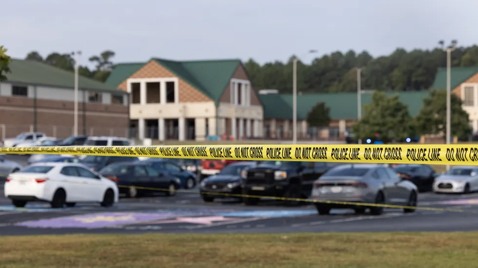 Police tape surrounds the perimeter of Apalachee High School