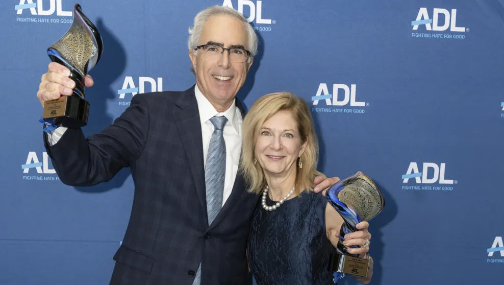 Karl Stern &amp; Ann B. Stern holding their awards at the 2026 Karen H. Susman Jurisprudence Award Luncheon