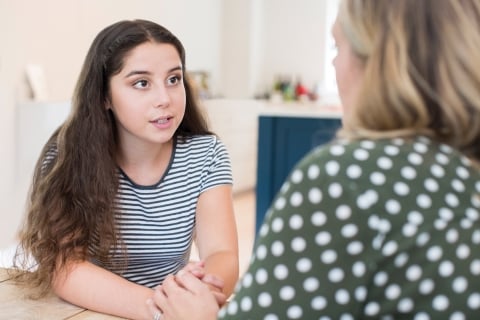 Mother Having Serious Conversation With Teenage Daughter