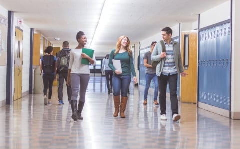 High School Students Walking in Hallway