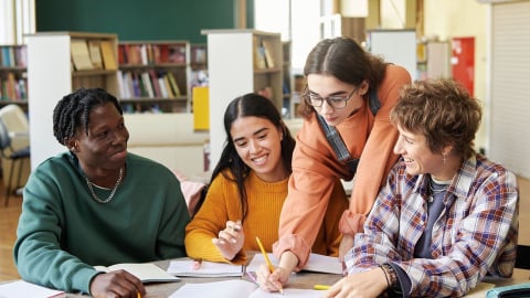 high school students working together on a project