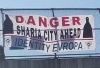 sanctuary city highway banner