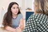 Mother Having Serious Conversation With Teenage Daughter