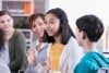 Teenage girl talks in group therapy session