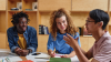 Group of young people studying together