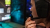 Young woman gamer playing