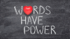 "Words Have Power" phrase written on chalkboard with red heart